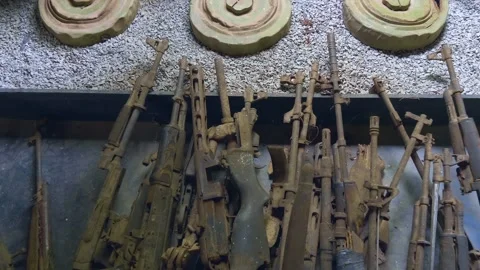 Old machine guns and and various mines are placed on exhibition in War Museum  Stock Footage 318663604