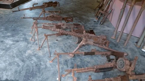 Old machine guns are placed on exhibition in War Museum in Siem Reap, Cambodia Stock Footage 318733759