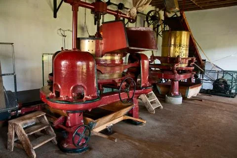 Old machine at small tea factory Stock Photos