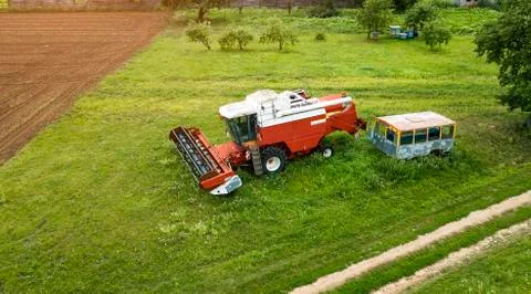 Old machine in the yard of a farmer the view from the drone Stock Photos