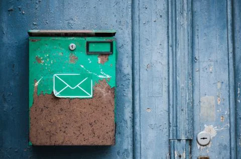Old mailbox on a building wall, close-up Stock Photos