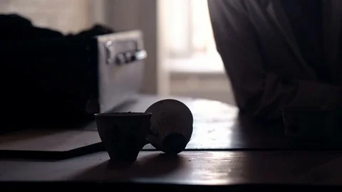 An old man of aristocratic appearance, but a bit disheveled, collects an old Video stock 100372959