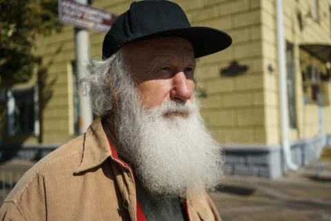 Old man with a beard on the street Stock Photos