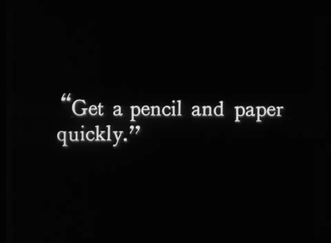 Old man in bed writing on piece of paper with pen, United Kingdom, 1923 Stock Footage 172219562