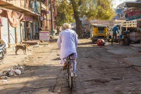 Old man on a bicycle Stock Photos