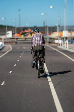 Old man on a bicycle Stock Photos