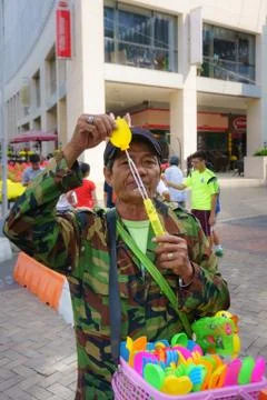 Old man with bubble wand Stock Photos