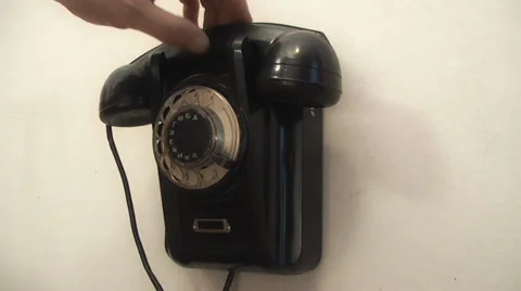 Old man calling for help, vintage on telephone Stock Footage 39311944