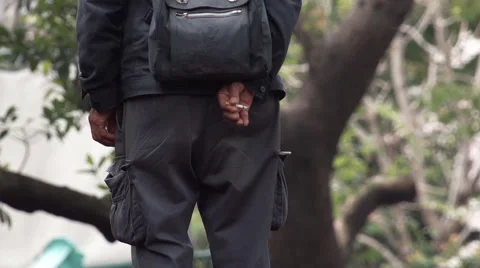 Old man with cigarette in Ueno Park, Tokyo, Japan Stock Footage 53202491