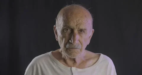 Old man is crying. Loneliness concept. Elderly, aged guy is in sad, depression. Stock Footage 136762650