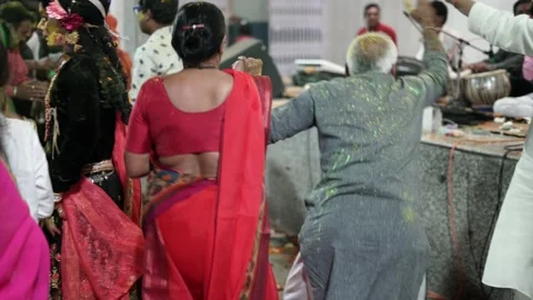 An Old Man Dancing with Radha Krishna during Maharaas function Stock Footage 130888772