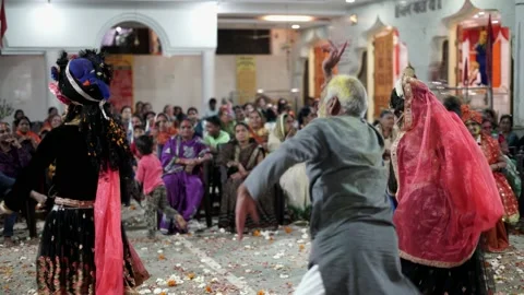 An Old Man Dancing with Radha Krishna during Maharaas function Video stock 130966530