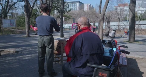 Old man dangcing in the park Beijing gh5 4k Video stock 97420536