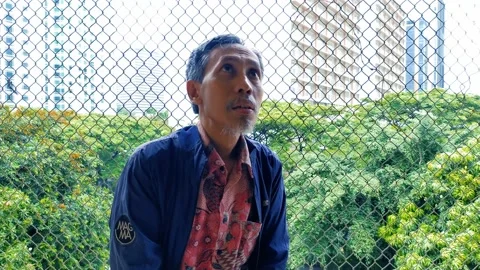 Old Man Depressed Sitting Alone Outdoors With Hopeless Eye Stock Footage 190937296