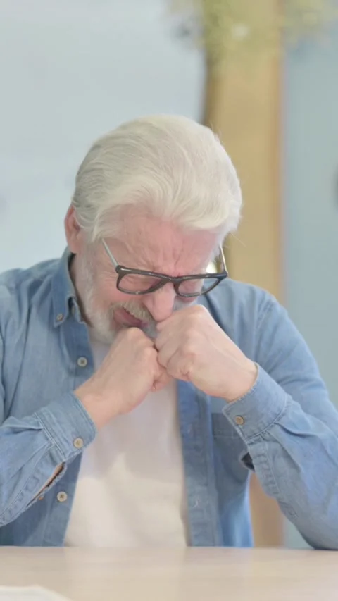 Old Man in Depression and Anxiety Feeling Uncomfortable, vertical video Video stock 329106961