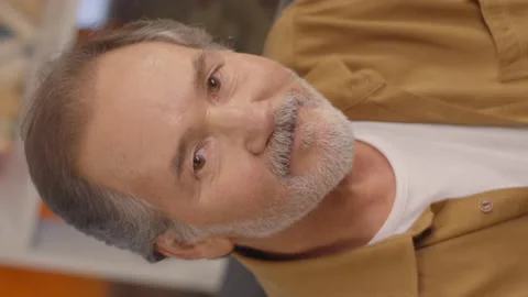 The old man does not react to his wife, who argued furiously and shouted. Stock-Footage 152018655