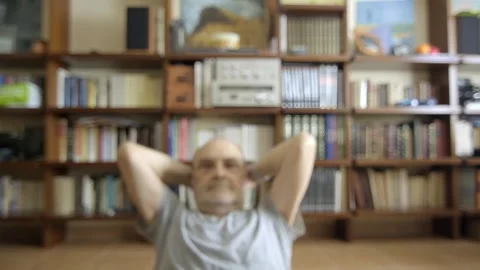 Old man doing abs exercises Stock Footage 307739728