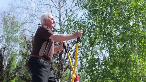 Old man doing exercises on the street. Stock Footage 75246406
