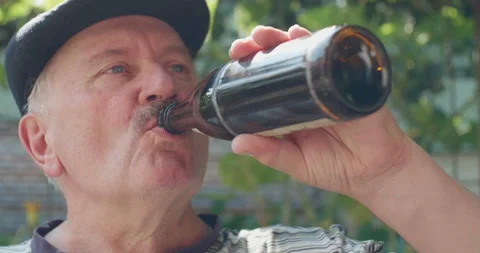 Old Man Drinking Beer Stock Footage 139229188