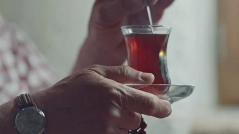 An old man is drinking tea in their home. Stock Footage 170035107