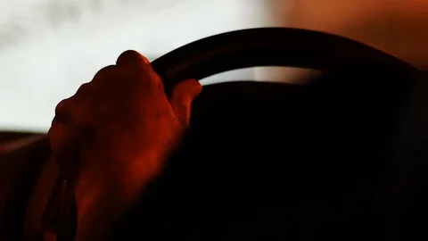 Old man driving car thought dark tunnel in day time Stock Footage 80904305