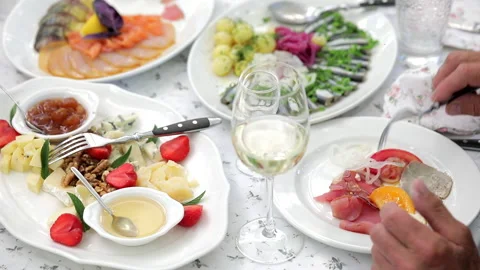 The old man eats at the table Stock Footage 245606076