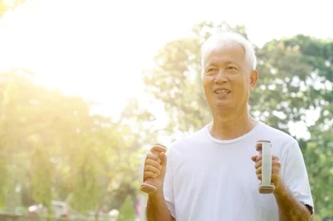 Old man exercise outdoor Stock Photos