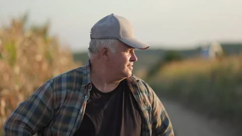 Old Man Farmer Posed in Field, Ready for Agricultural Work Stock Footage 282741820