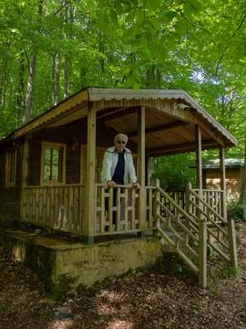 Old man in forest Stock Photos