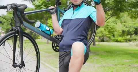 Old man holding a bicycle Stock Footage 139449627