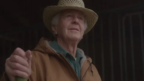 Old Man Looking Out From Barn Видео 270334839