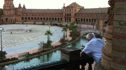 Old Man Looks Out Over Balcony at Plaza de Espana Stock Footage 10729455