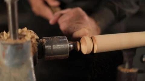 Old man is making Kamancha musical instrumental tool from wood at workshop Stock Footage 229310764