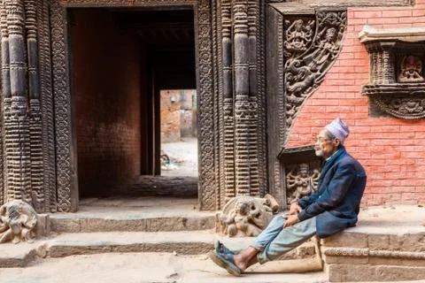 Old Man Outside a Temple Stock Photos