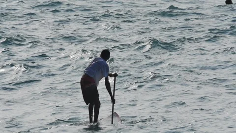 Paddle Boarding Stock Footage ~ Royalty Free Stock Videos | Pond5