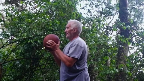An old man plating basketball. Video stock 122480157