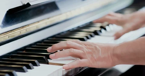 Old man play the piano Stock Footage 113307133