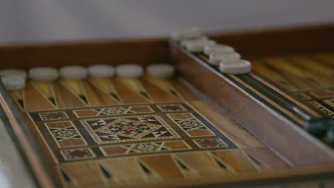 Old man playing backgammon with grandson. Stock Footage 88121730