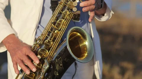 Old man playing the saxophone Stock Footage 55843469