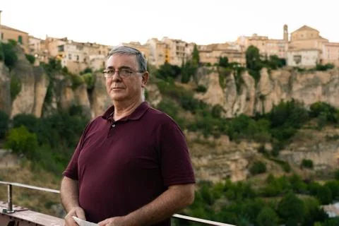 Old man portrait while visiting Cuenca smiling to camera Stock Photos