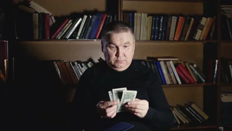 Old man pulls money out of wallet poor Video stock 148261133