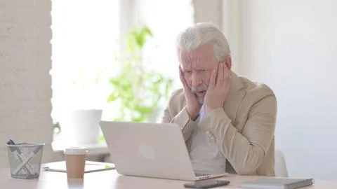 Old Man Reacting to Loss While using Laptop Stock Photos