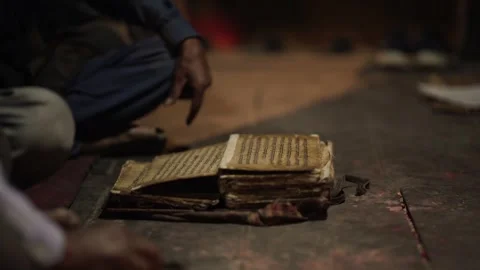 Old Man reading traditional scriptures in the Kathmandu Valley Stock Footage 284219341