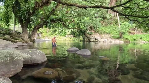 An old man in the river Stock Footage 278510084
