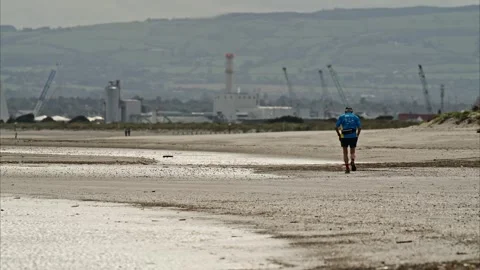 Old man runing on the beach Stock Footage 317248239