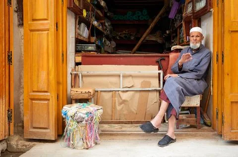 Old man in second hand shop at medina in Fez Morocco Stock Photos
