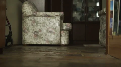 Old Man Shuffles Along Pushing A Walker Frame Stock Footage 58615340