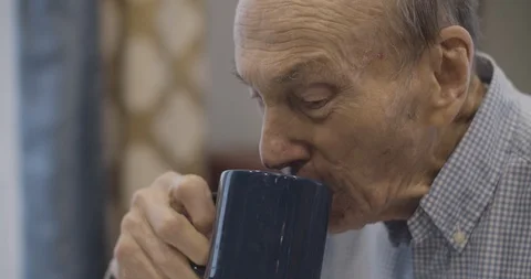 Old Man Sipping coffee Stock Footage 114192049