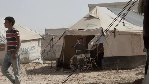 Old Man Sitting Inside His Tent In A Syrian Refugee Camp Stock Footage 76724083