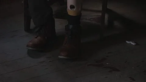 Old Man Slow Motion Pulls Pant Leg Down To Hide Wooden Leg Stock Footage 154065502